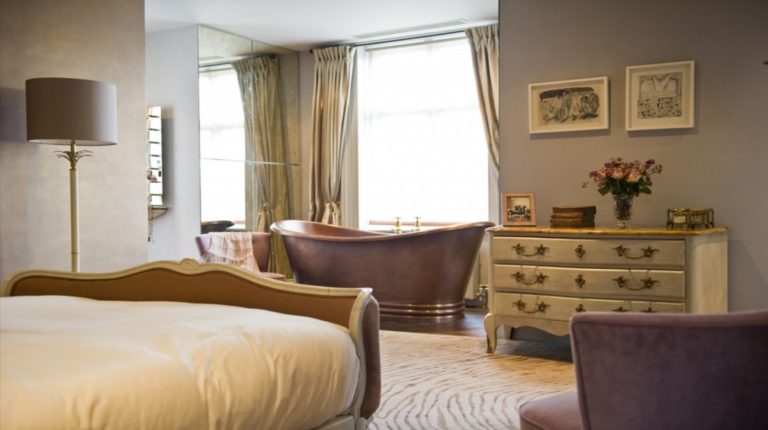 Bedroom with Ribbed Taupe hand-knotted contemporary rug | Bazaar Velvet