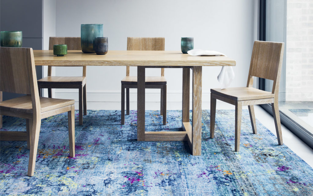 blue rug in dining room