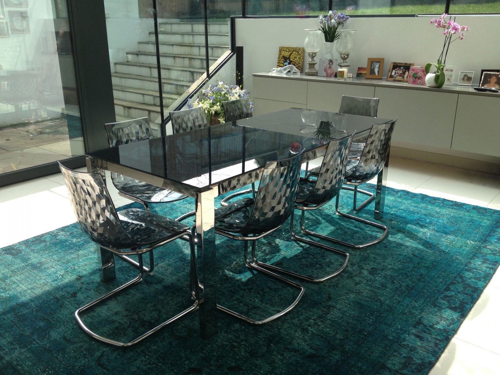 teal over-dyed vintage rug in dining room