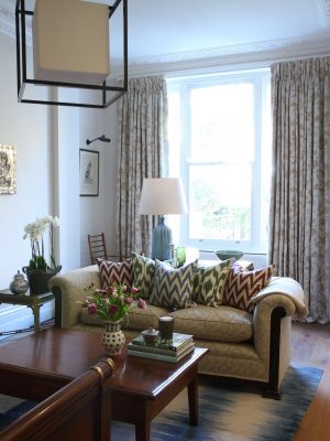 clssic living room with handmade blue and cream kelim