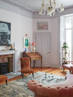 green anstract rug with pink sofa by rachel chudley inteior design