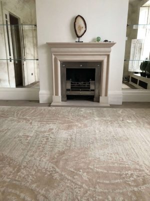 cream luxury rug with fireplace