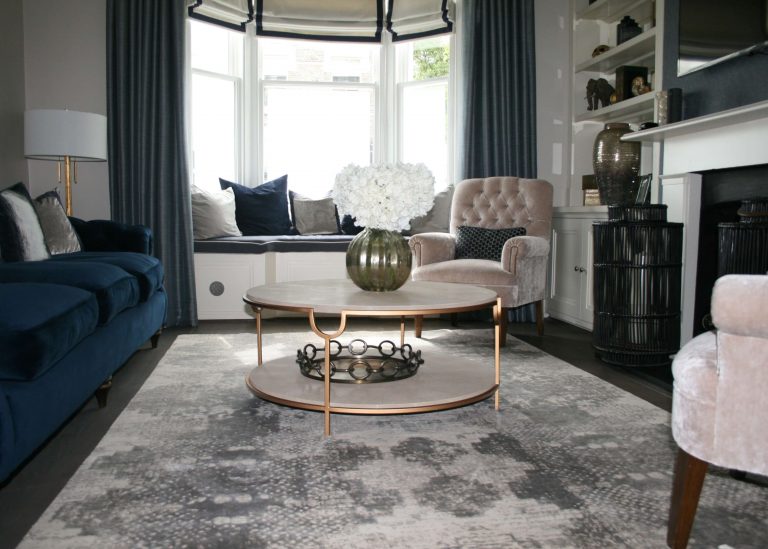 silver silk modern rug with pattern in contemporary living room with bay window