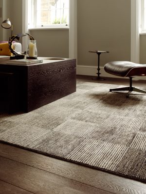 brown patterned rug in formal room