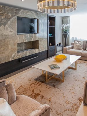 contemporary rug in luxurious living room by katheryn levitt design
