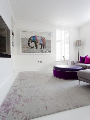 grey and purple rug in white room