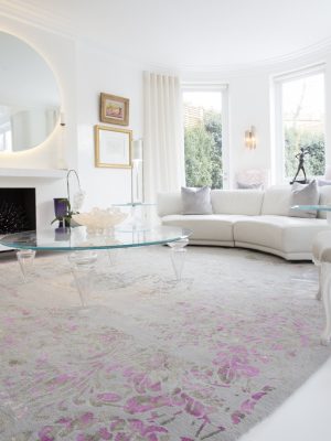 pink and grey rug in light living room