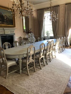 vintage persian rug in large classic dining room