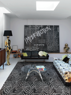 brown leaf design rug in interior by jimmie martin