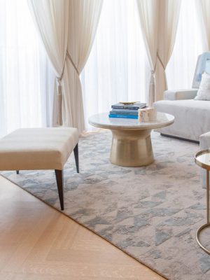 blue silk and cream rug in luxury living room by kathryn levitt design
